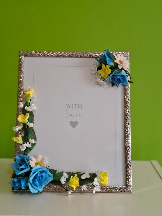 Handmade floral picture frame with blue and yellow flowers for home decoration and memory photos