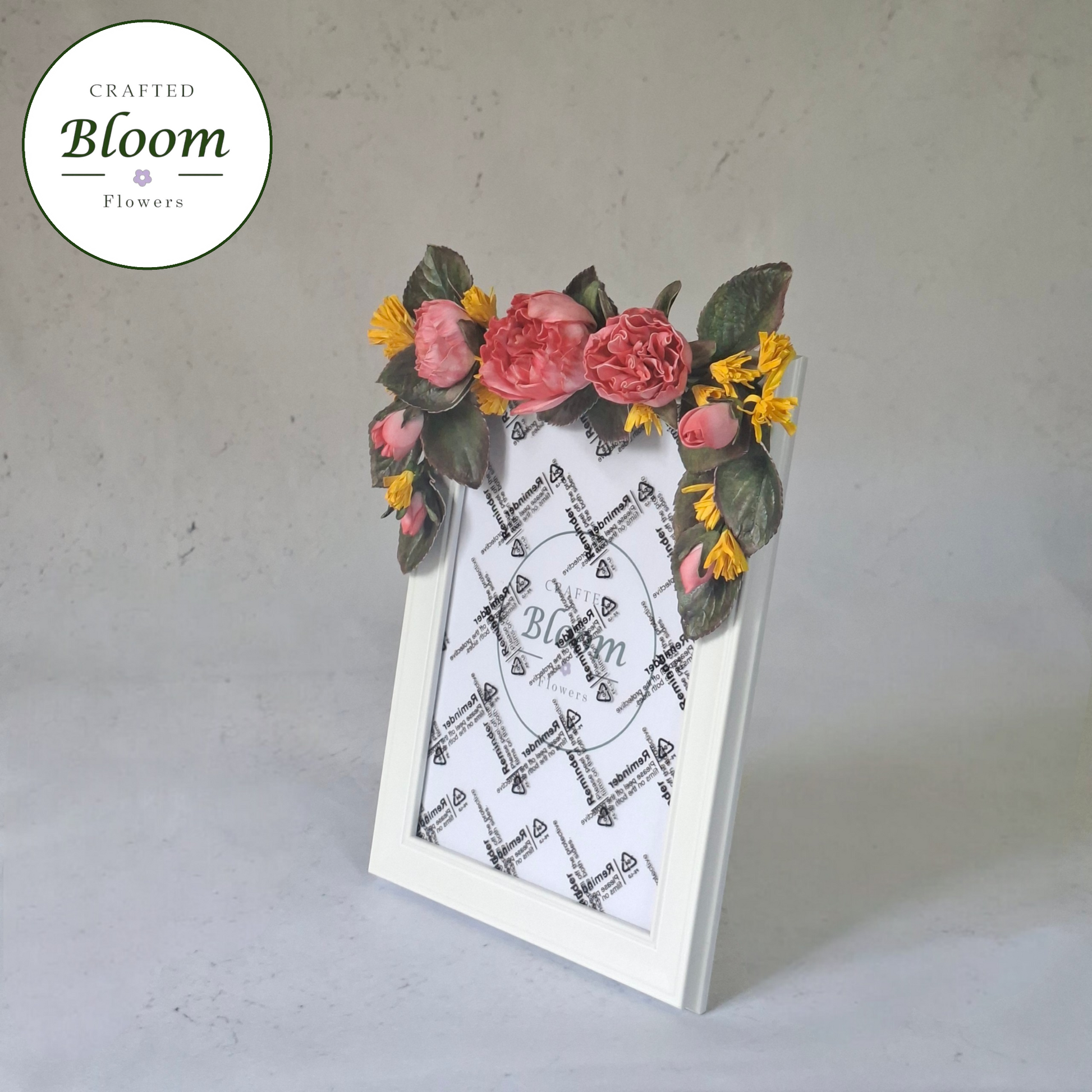 Close-up of handmade foamiran peony and wildflower details