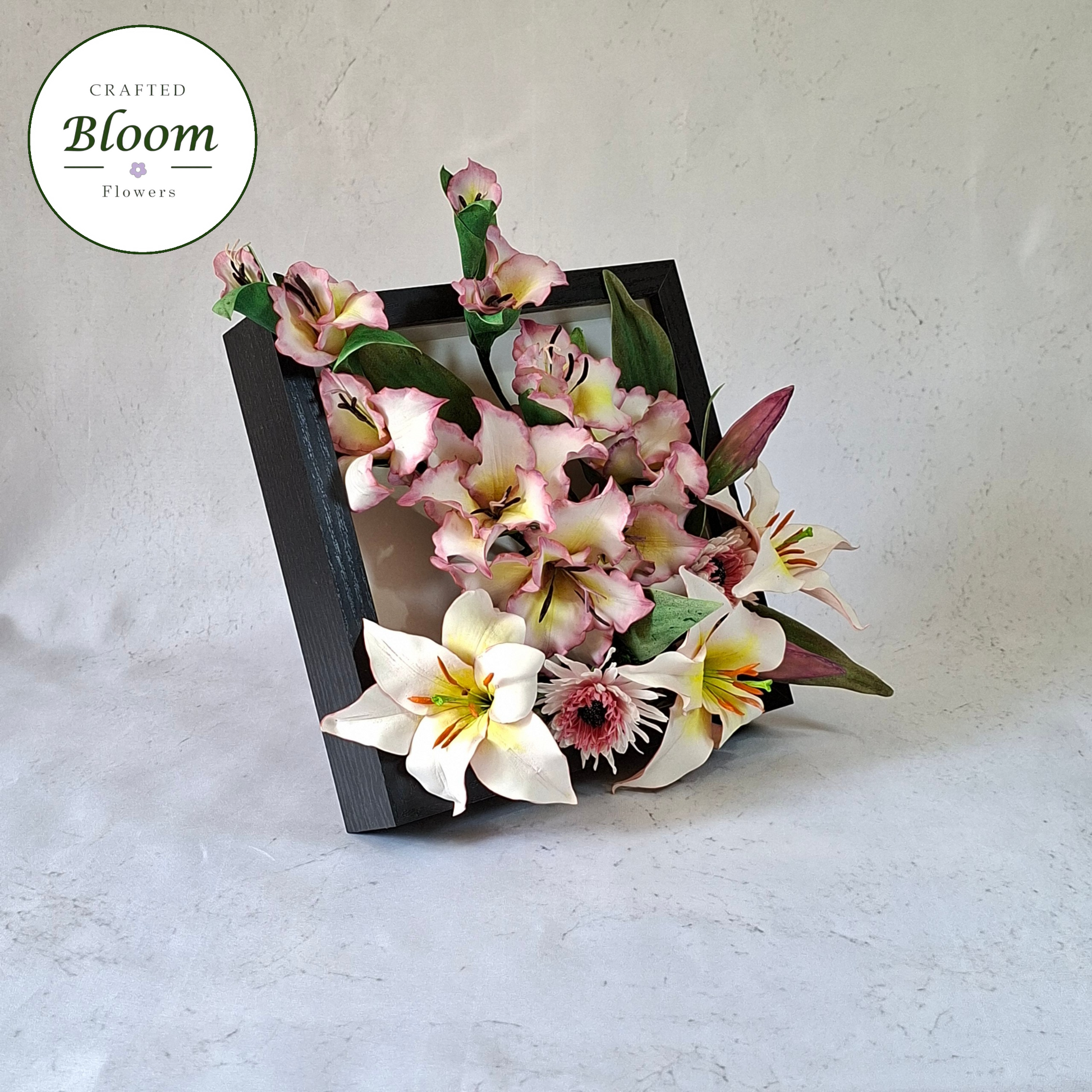 handmade gladiolus and lilium regale set in a elegant black tabletop frame perfect for gift, and luxury home decorations