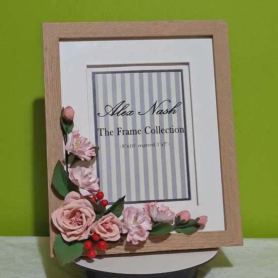 Handmade pink rose floral photo frame with elegant beige table and wall frame and decorative flowers for home decor