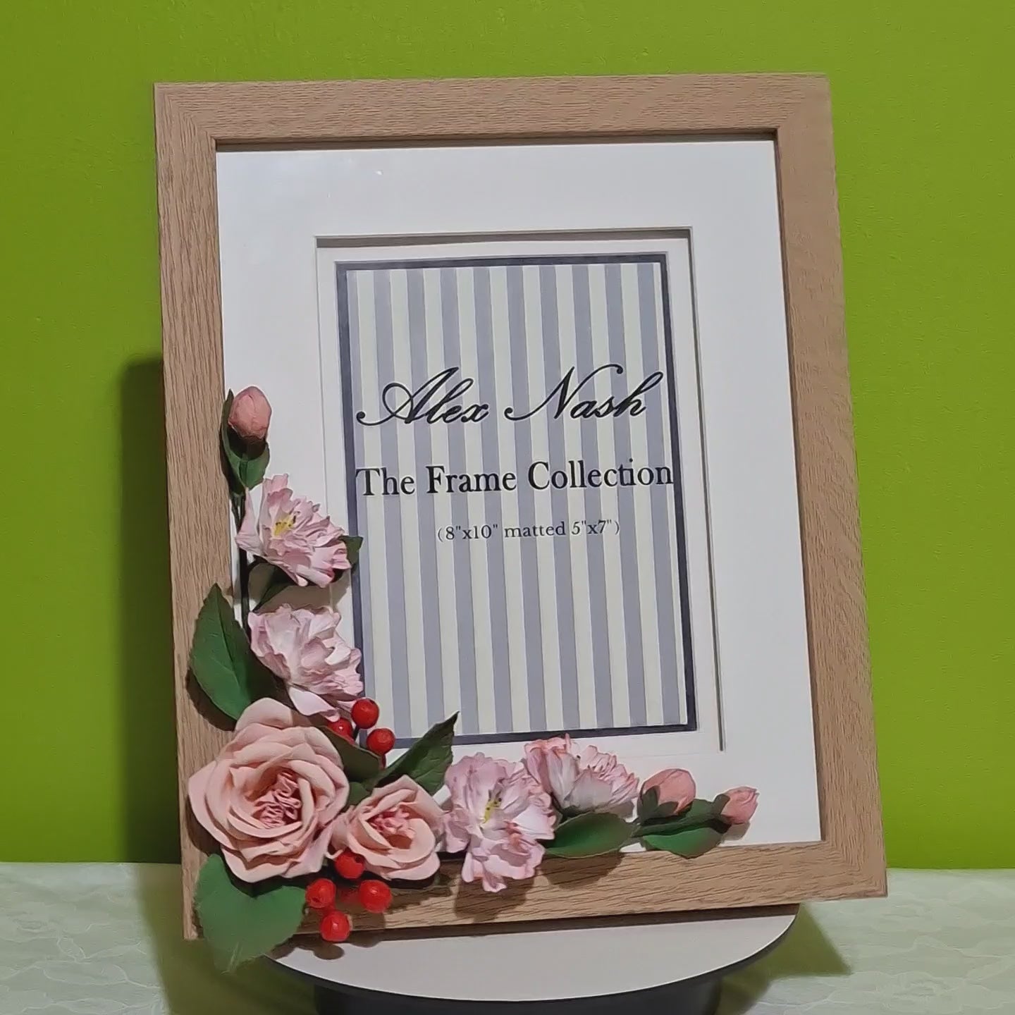 Handmade pink rose floral photo frame with elegant beige table and wall frame and decorative flowers for home decor