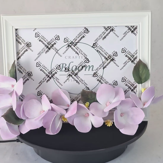 White photo frame with purple hydrangea floral frame border, handmade in Ireland