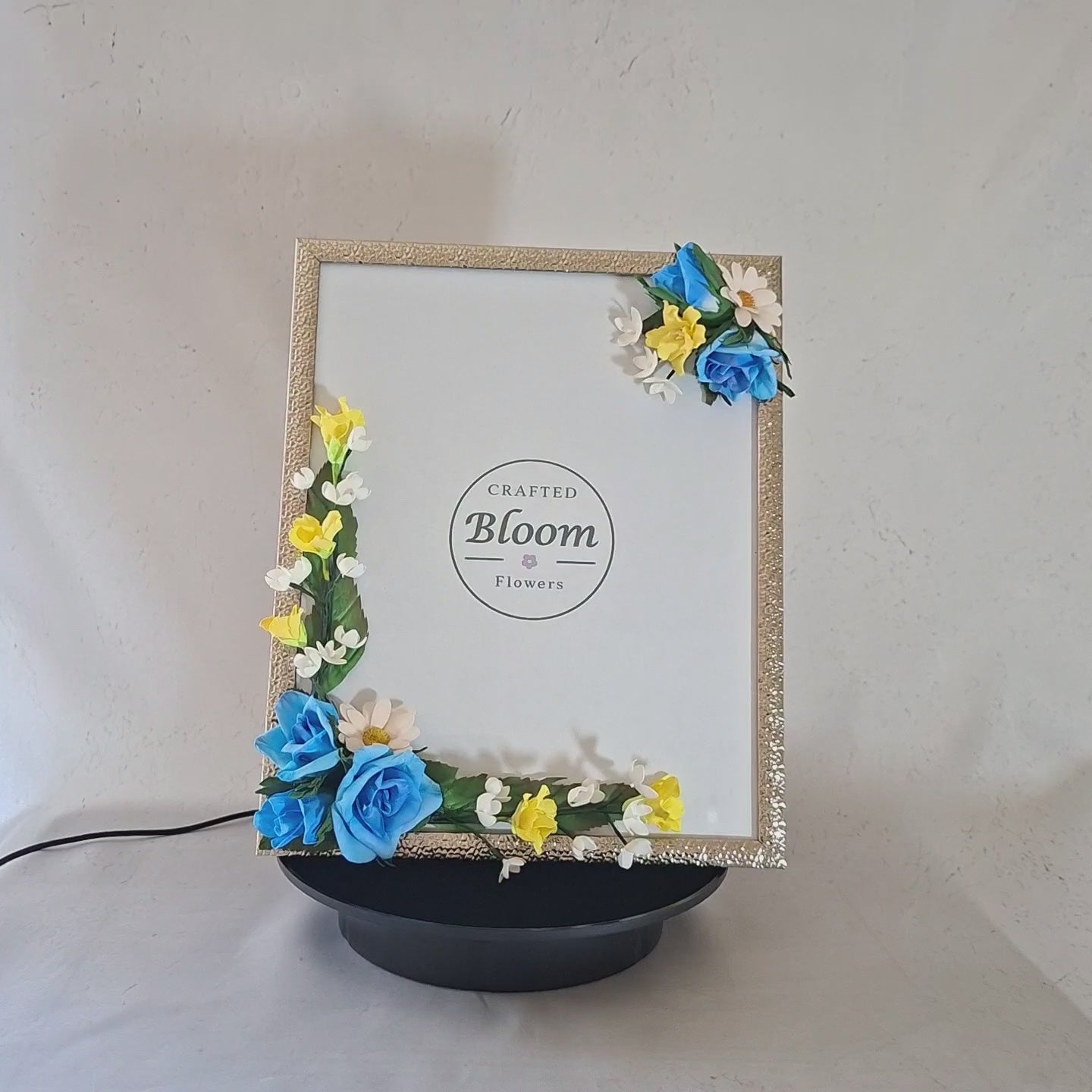 Handmade floral photo frame with blue roses and yellow flowers for home decoration and memory photos, perfect for children's photo , special moments, or as a thoughtful handmade gift.